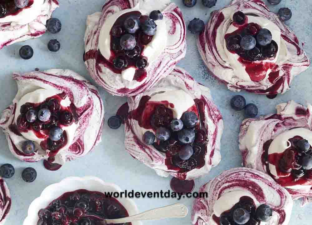 Swirled Meringues with Blueberry Sauce dessert